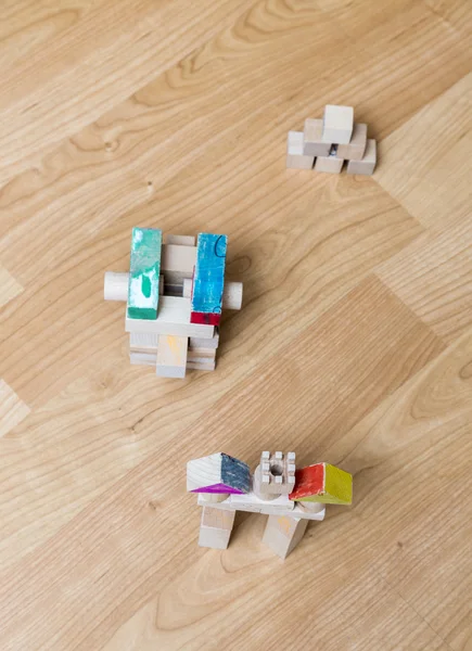 Castle made by wooden pieces on the floor — Stock Photo, Image