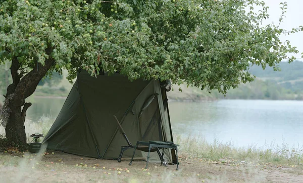 carp tent by the lake in search of big fish