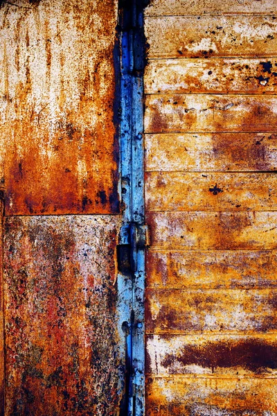 Oude metalen achtergrond met gebarsten verf en roest — Stockfoto