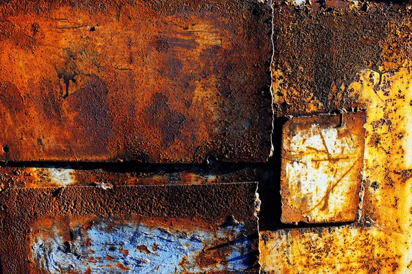 Rusty metal with old paint and aged by time — Stock Photo, Image