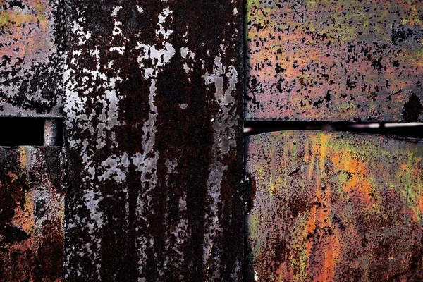 Kovové pozadí s staré popraskané barvy na něm — Stock fotografie