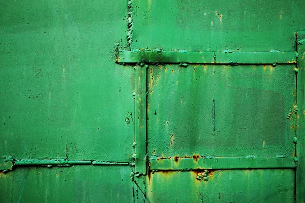 Vieux fond métallique rouillé avec de la peinture fissurée de temps en temps — Photo