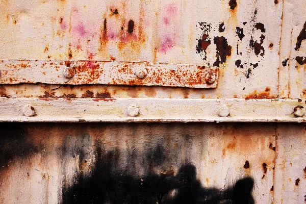 Antiguo fondo de metal oxidado con pintura agrietada de vez en cuando — Foto de Stock
