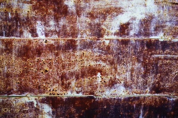 Rostiger metallischer Hintergrund mit alten Rissschmerzen — Stockfoto