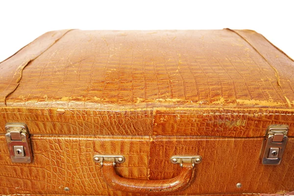 Старый потрепанный желтый чемодан — стоковое фото