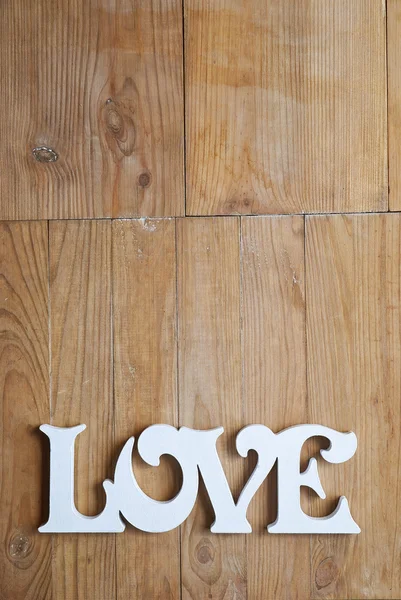 Wooden background with love word — Stock Photo, Image