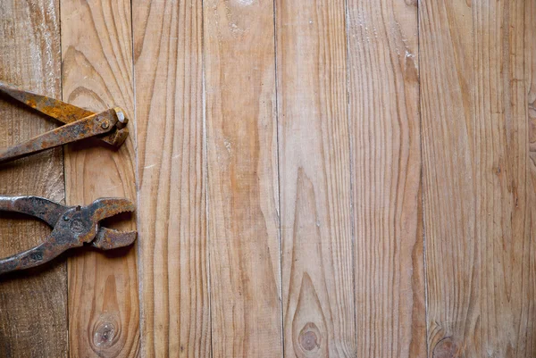 Old tools on wooden background — Stock Photo, Image