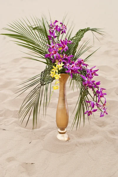 Beautiful abstract flowers bouquet in the desert sand — Stock Photo, Image