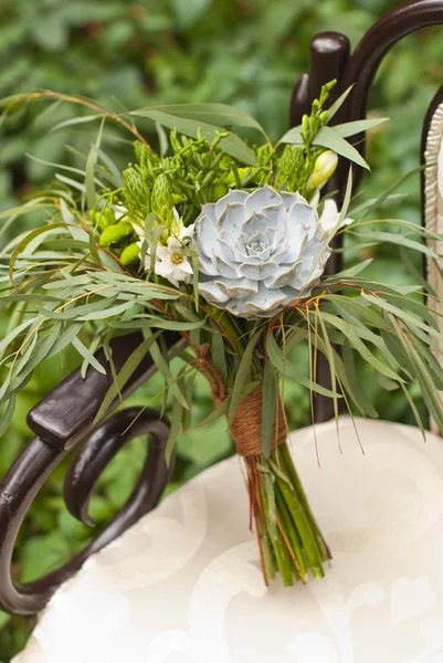 Wedding bouquet at vintage chair — Stock Photo, Image