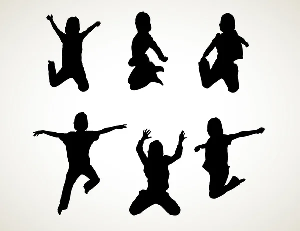 Çocukların atlama Silhouettes — Stok fotoğraf