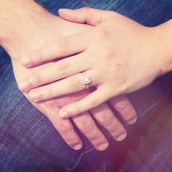 Hands together showing the ring — Stock Photo, Image