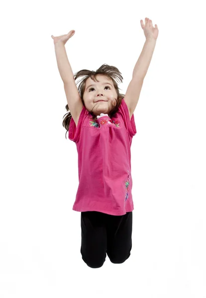 Feliz niña saltando en el aire — Foto de Stock