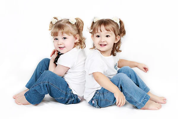 Adorable little sisters — Zdjęcie stockowe
