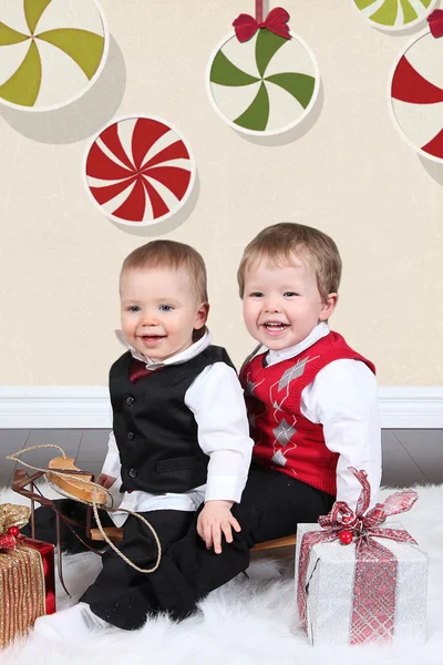 Cute little boys with gifts — Stock Photo, Image