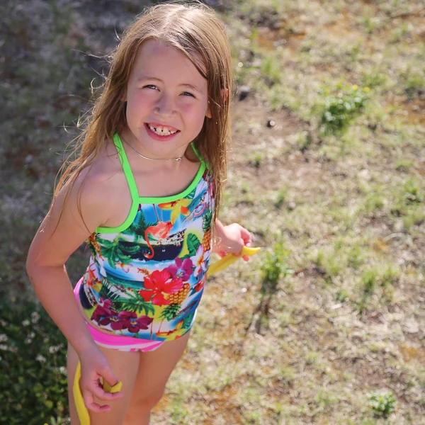 Little girl standing noutdoors — Stock Photo, Image