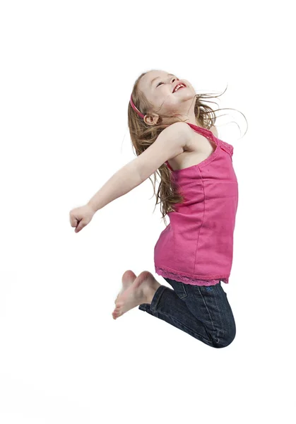 Feliz niña saltando en el aire — Foto de Stock