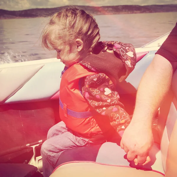 Little girl in life jacket — Stock Photo, Image