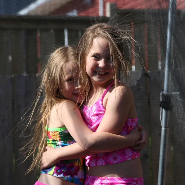 Little girls hugging — Stock Photo, Image