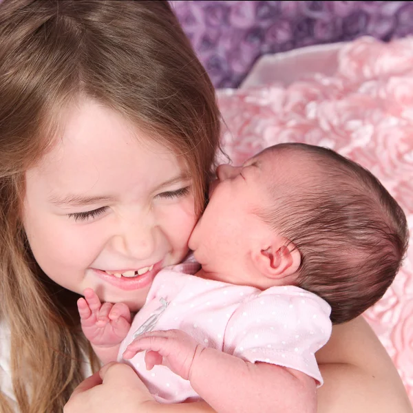 Sisters posing  in studio — Stock Photo, Image