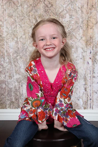 Little Girl sitting in Studio — Stock Photo, Image