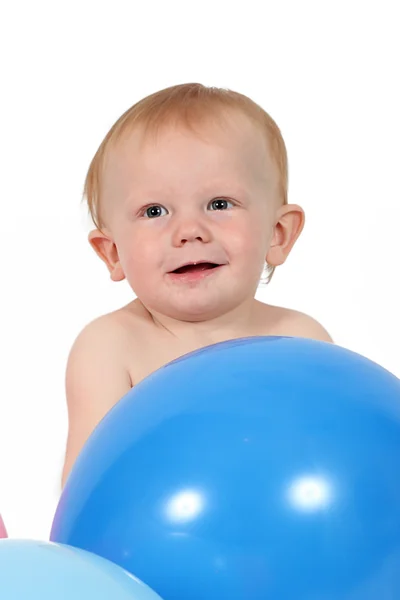 Liten pojke med ballonger — Stockfoto