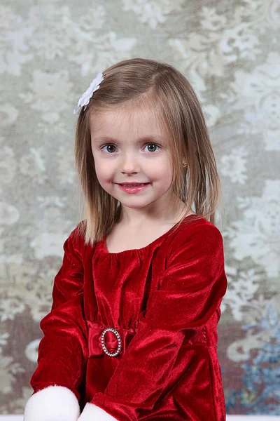 Menina no vestido de Natal — Fotografia de Stock