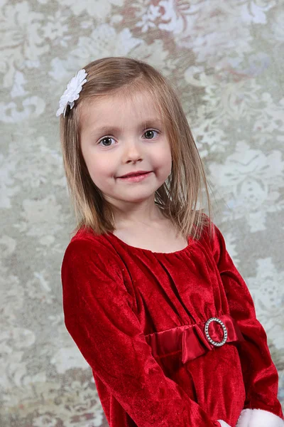 Menina no vestido de Natal — Fotografia de Stock