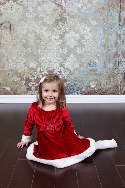 Menina no vestido de Natal — Fotografia de Stock