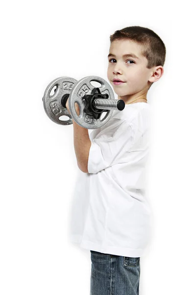 Confident boy with dumbbell — Stock Photo, Image