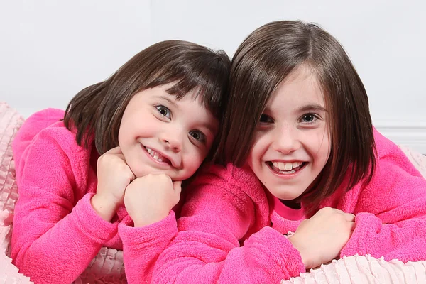 Little girls posing in pajamas — Stock Photo, Image