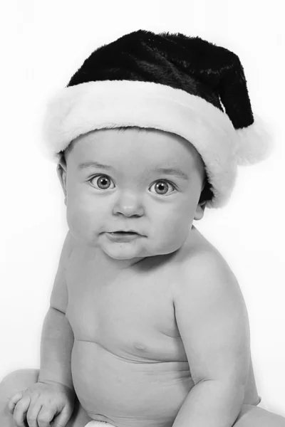 Bébé garçon en chapeau de Père Noël — Photo