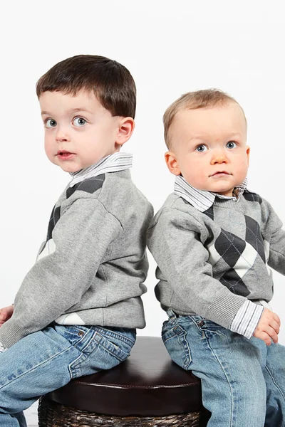 Little boys pose sitting — Stock Photo, Image
