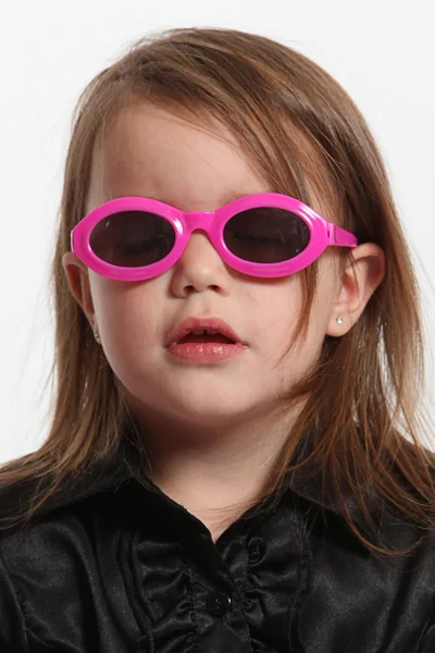 Girl in pink sunglasses — Stock Photo, Image