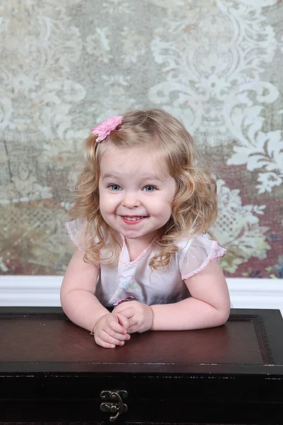 Little Girl Sitting on Suitcase — Stock Photo, Image