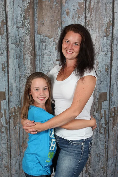 Mother and daughter smiling — Stock Photo, Image