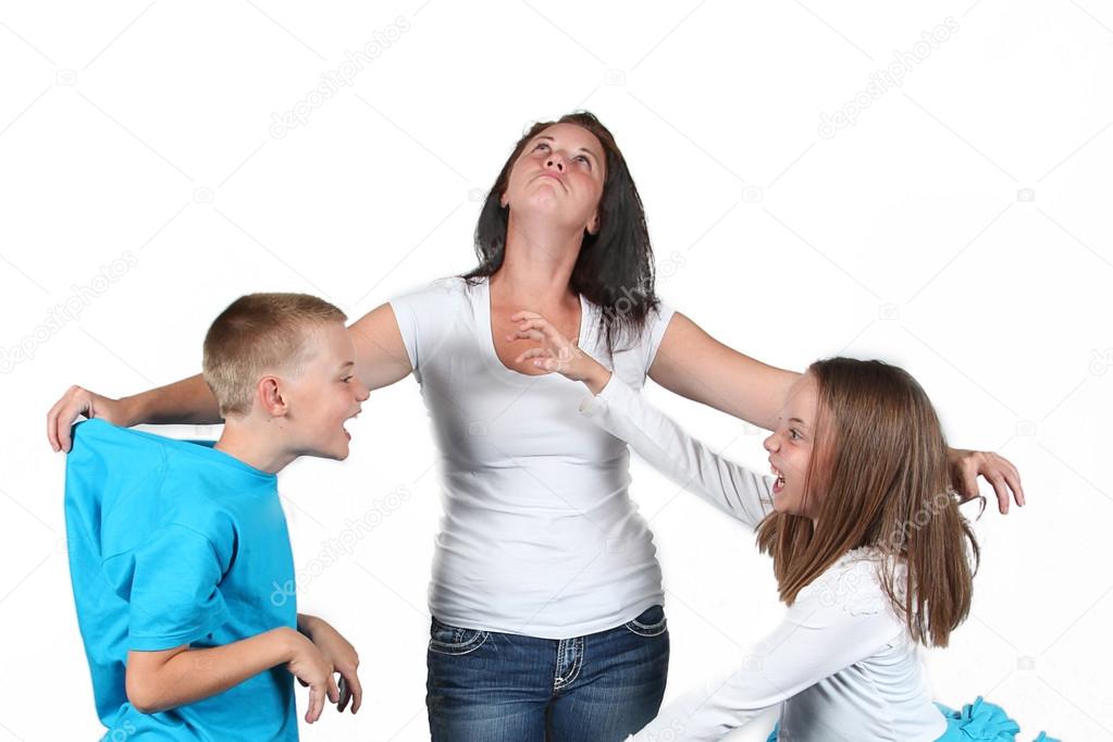 Mother holding two kids