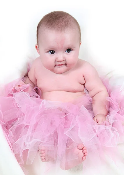 Menina bebê na saia rosa — Fotografia de Stock