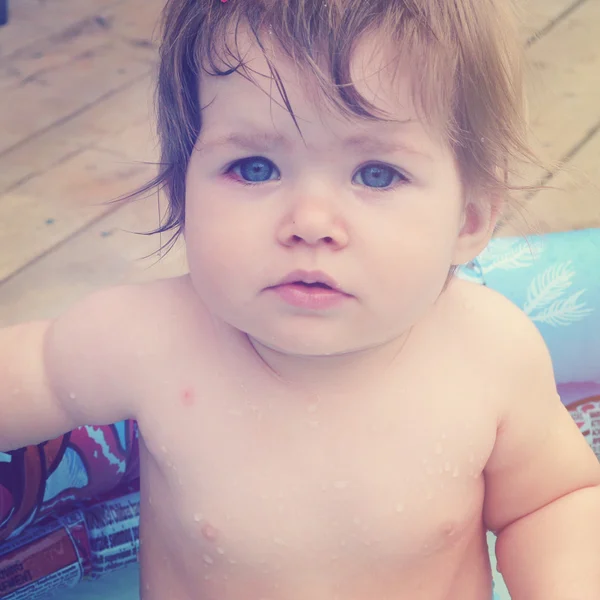Baby in pool — Stock Photo, Image