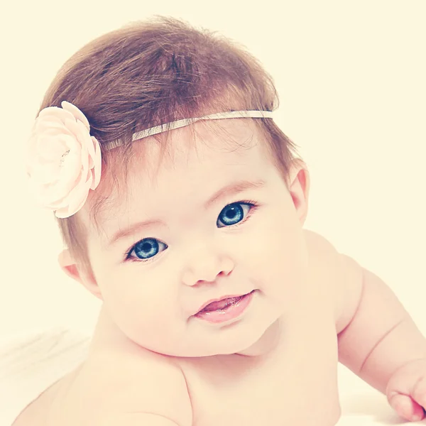 Newborn baby girl posing for camera — Stock Photo, Image