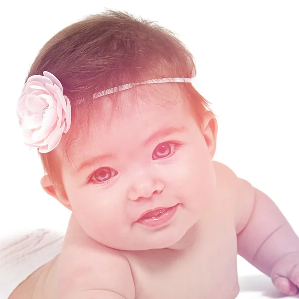 Newborn baby girl posing for camera — Stock Photo, Image