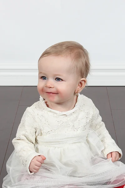 Little girl wearing white dress — Stock Photo, Image