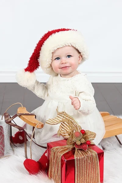 Little girl in hat of Santa Claus — Stock Photo, Image