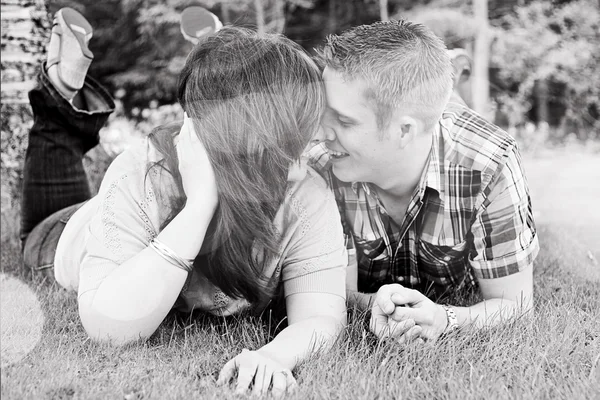 Black and white photo of young caucasian couple — Stock Photo, Image