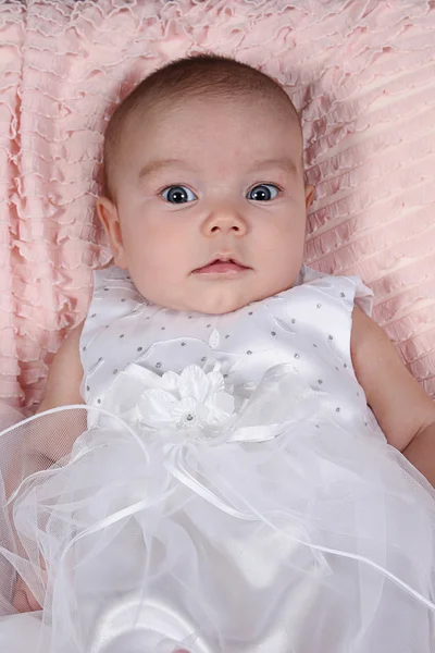 Little girl lying on blanket — Stock Photo, Image