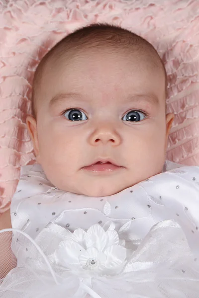 Little girl lying on blanket — Stock Photo, Image