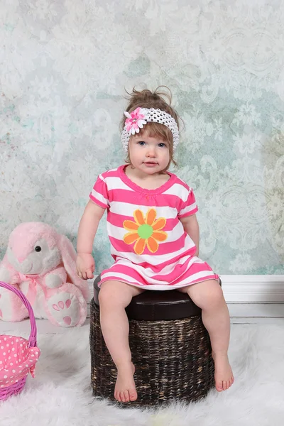 Little girl sitting in Studio — Stock Photo, Image