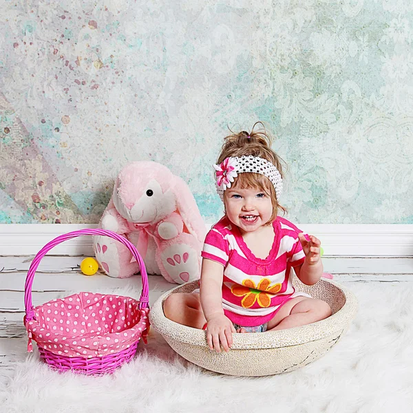 Little girl in basket — Stock Photo, Image