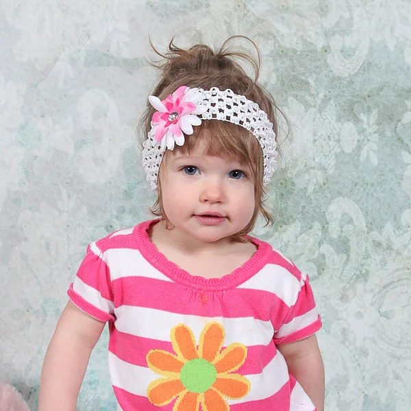 Little girl in pink striped shirt — Stock Photo, Image