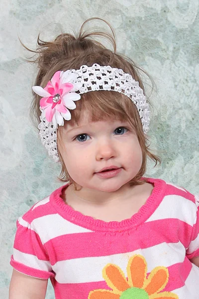 Little girl in pink striped shirt — Stock Photo, Image