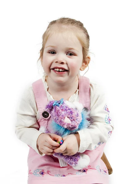 Adorable little girl with toy — Stock Photo, Image